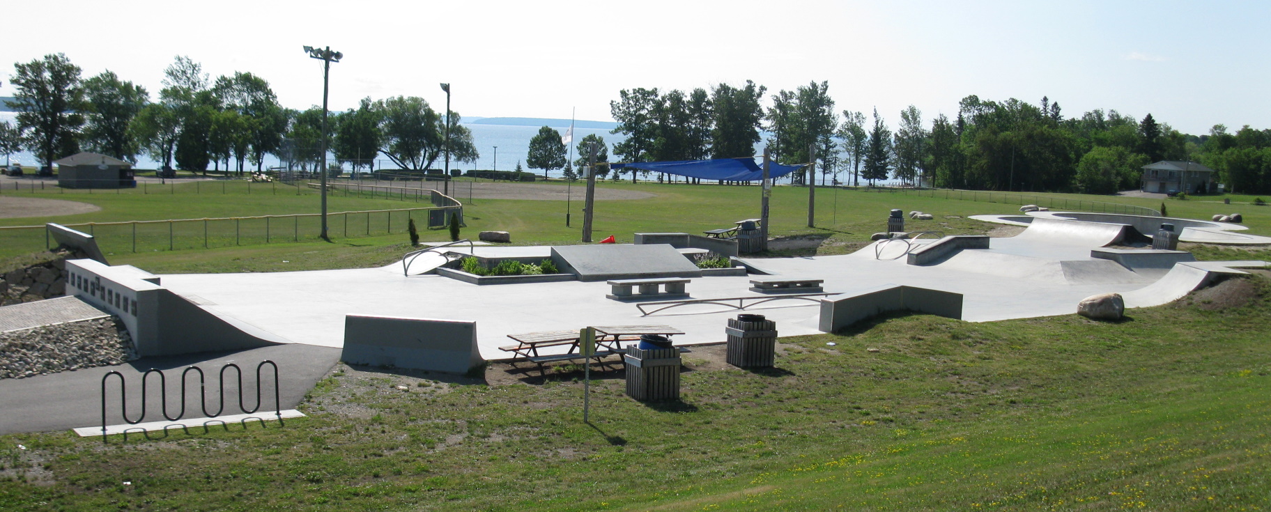 Empty skatepark overlooking the lake